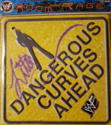 "Dangerous Curves Ahead" WWF Lita Sign
