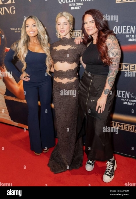 new-york-ny-march-4-2025-trish-stratus-emily-bett-rickards-wearing-dress-by-heiress-and-amy-dumas-lita-attend-premiere-of-queen-of-the-ring-at-amc-lincoln-square-in-new-york-on-march-4-2025-credit-lev-radinalamy-live-news-3A0P83M.jpg