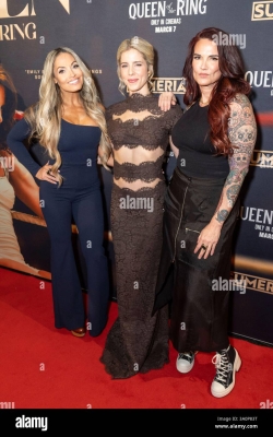 new-york-ny-march-4-2025-trish-stratus-emily-bett-rickards-wearing-dress-by-heiress-and-amy-dumas-lita-attend-premiere-of-queen-of-the-ring-at-amc-lincoln-square-in-new-york-on-march-4-2025-credit-lev-radinalamy-live-news-3A0P83T.jpg